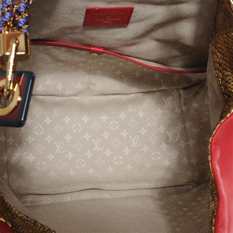 LOUIS VUITTON Safari Flight Bag Rouge .